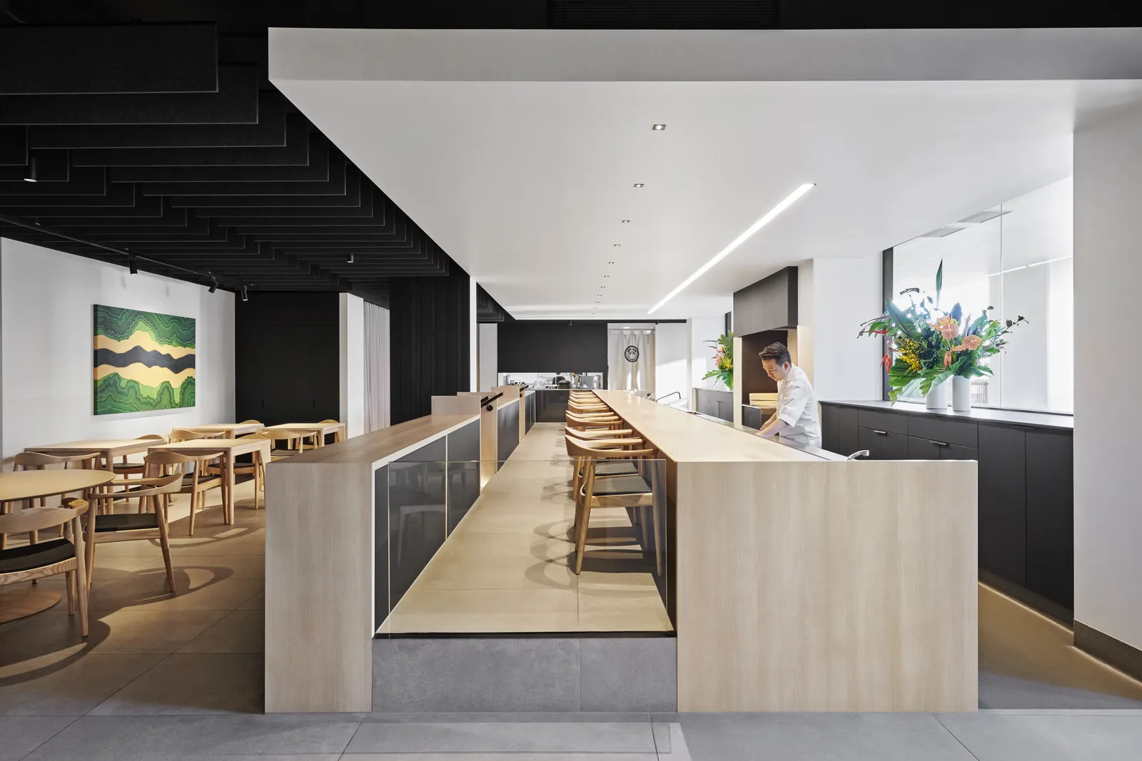 The sushi counter and dining room at KOMEYUI Brisbane